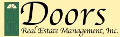 A yellow sign with the words " door estate management ".